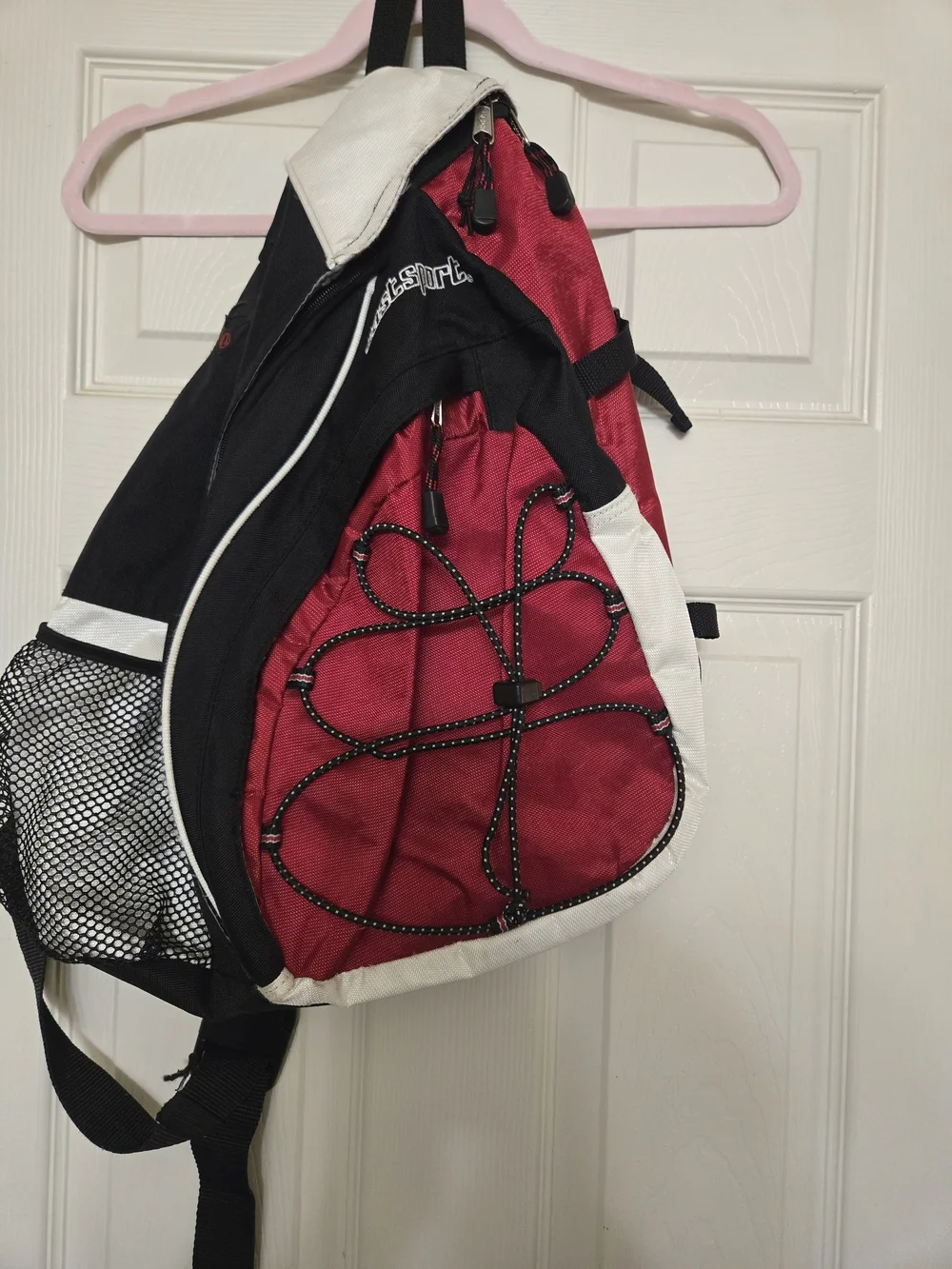 Eastsport Red and Black Sling Backpack with White Trim